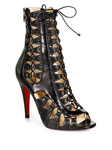 louboutin lace up shoes.